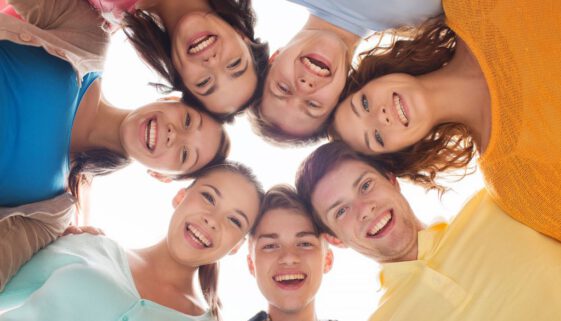 group of smiling teenagers